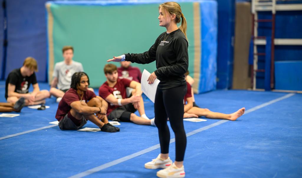 Springfield College graduate students in the Athletic Counseling program conduct a workshop with the Men’s Gymnastics team on December 6, 2023.