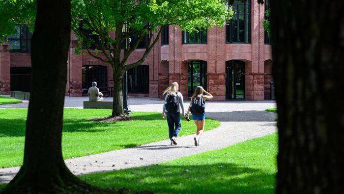 Students cross the Springfield College campus on Tuesday, September 19, 2023.